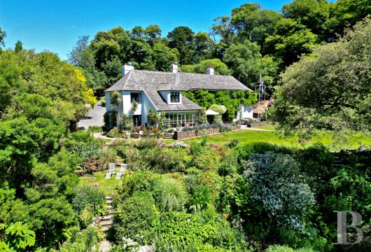 In South Devon, a Georgian mansion perched above Start Bay, with a private cove and some 13 hectares of cliffs ...